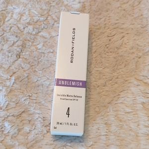 Rodan and Fields Unblemish Invisible Matte Defense.